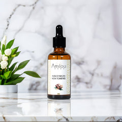 Flacon d’huile d’argan cosmétique 100 % naturelle – soin visage et cheveux